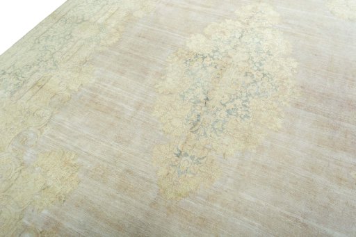 Backside of handmade 1970s Kerman rug showing knot structure and weave density