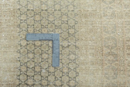 Backside of handmade 1970s Kerman rug showing knot structure and weave density