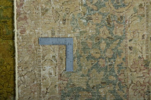 Backside of handmade 1970s Kerman rug showing knot structure and weave density