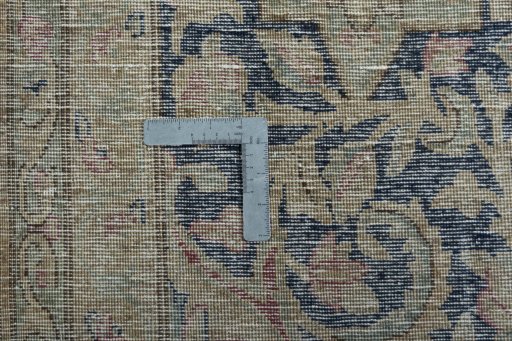 Surface texture of 1970s Kerman rug with natural Wool and intricate pattern