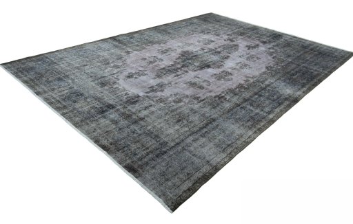 Corner detail of 1970s Kerman rug showing border pattern and Wool pile