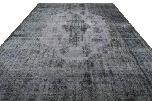 Surface texture of 1970s Kerman rug with natural Wool and intricate pattern