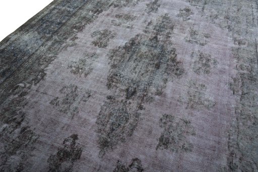 Backside of handmade 1970s Kerman rug showing knot structure and weave density