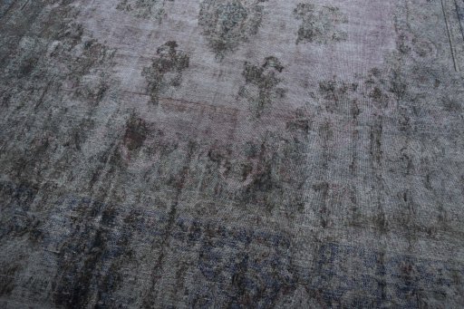 Close-up detail of 1970s Kerman rug from Iran / Persia showing Wool weave