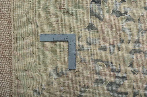 Backside of handmade 1970s Kerman rug showing knot structure and weave density