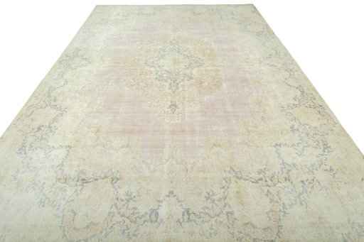 Surface texture of 1970s Kerman rug with natural Wool and intricate pattern