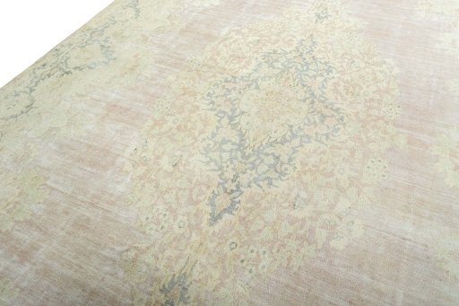 Backside of handmade 1970s Kerman rug showing knot structure and weave density