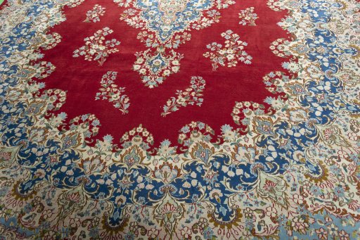 Close-up detail of 2000s Kerman rug from Iran / Persia showing Wool weave