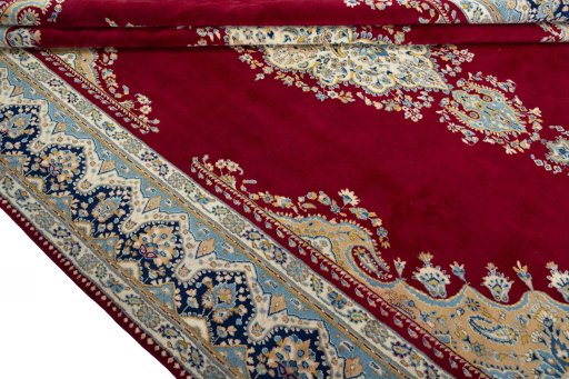 Close-up detail of 2000s Kerman rug from Iran / Persia showing Wool weave