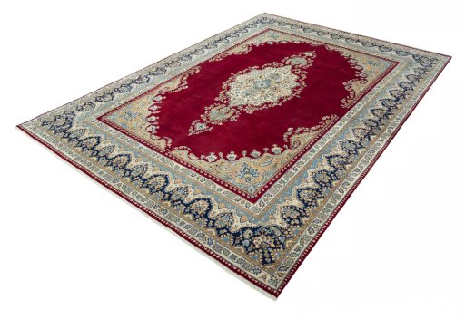 Corner detail of 2000s Kerman rug showing border pattern and Wool pile