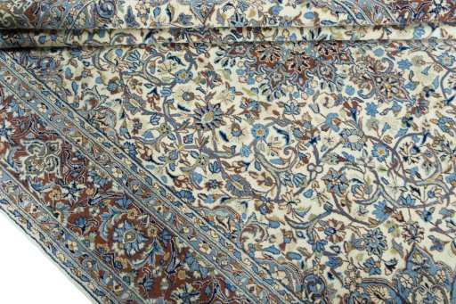 Close-up detail of 2000s Kerman rug from Iran / Persia showing Wool weave