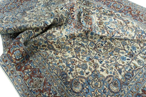 Surface texture of 2000s Kerman rug with natural Wool and intricate pattern