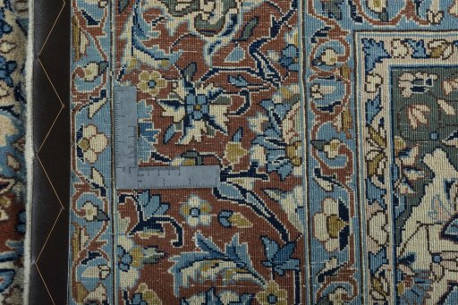 Backside of handmade 2000s Kerman rug showing knot structure and weave density