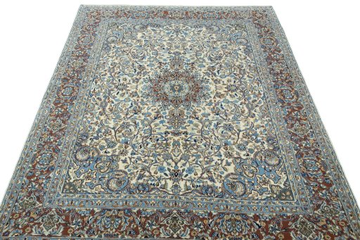 Surface texture of 2000s Kerman rug with natural Wool and intricate pattern