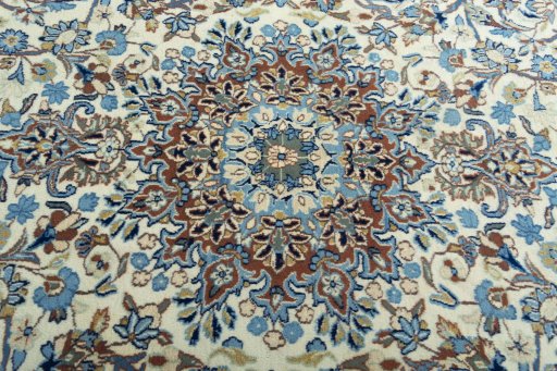 Central medallion detail of 2000s Kerman rug from Iran / Persia