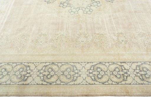 Corner detail of 1950s Kerman rug showing border pattern and Wool pile