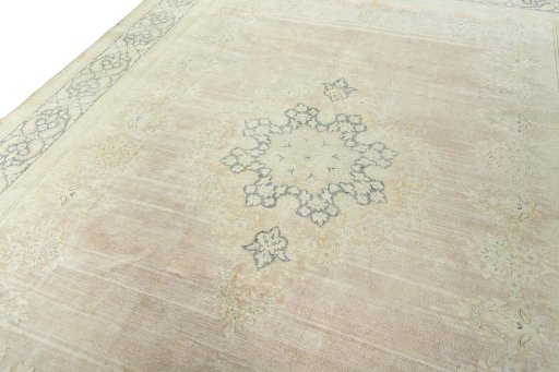 Backside of handmade 1950s Kerman rug showing knot structure and weave density