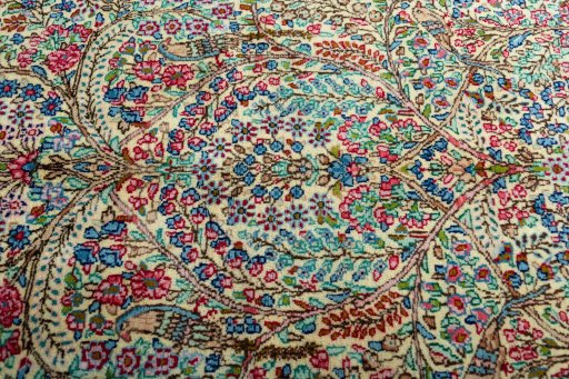 Central medallion detail of 2000s Kerman rug from Iran / Persia