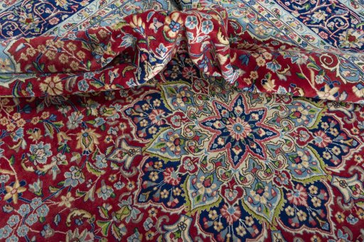 Surface texture of 2000s Kerman rug with natural Wool and intricate pattern