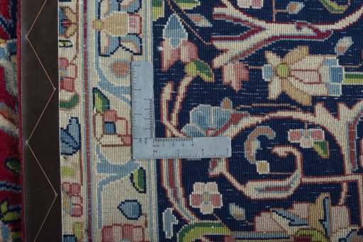 Backside of handmade 2000s Kerman rug showing knot structure and weave density