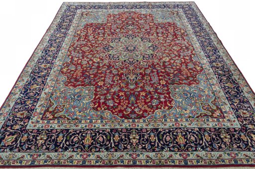 Surface texture of 2000s Kerman rug with natural Wool and intricate pattern