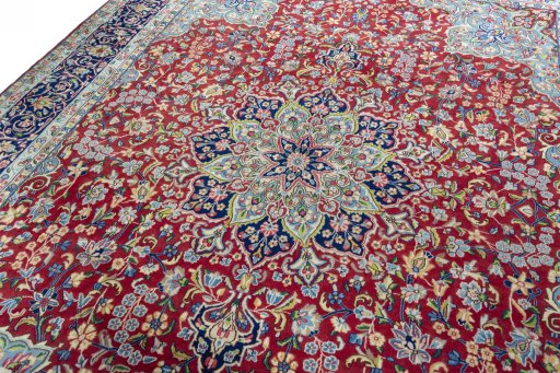 Backside of handmade 2000s Kerman rug showing knot structure and weave density