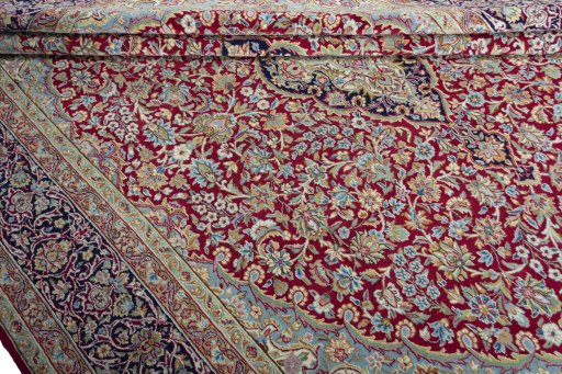 Close-up detail of 2000s Kerman rug from Iran / Persia showing Wool weave