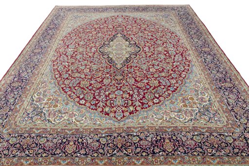 Surface texture of 2000s Kerman rug with natural Wool and intricate pattern