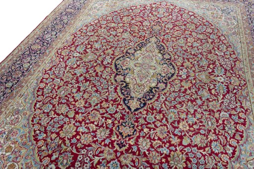 Backside of handmade 2000s Kerman rug showing knot structure and weave density
