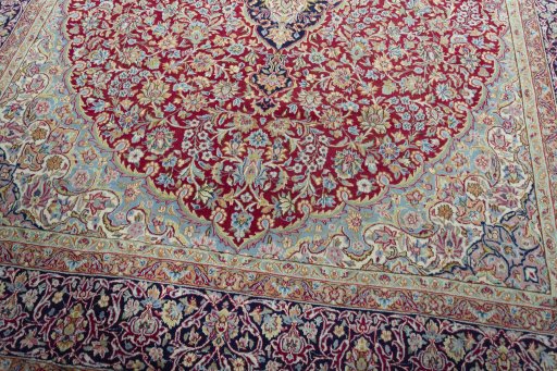 Close-up detail of 2000s Kerman rug from Iran / Persia showing Wool weave