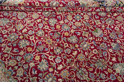 Close-up detail of 2000s Kerman rug from Iran / Persia showing Wool weave