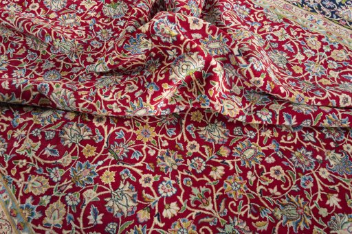 Surface texture of 2000s Kerman rug with natural Wool and intricate pattern