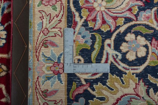 Backside of handmade 2000s Kerman rug showing knot structure and weave density
