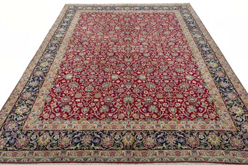 Surface texture of 2000s Kerman rug with natural Wool and intricate pattern