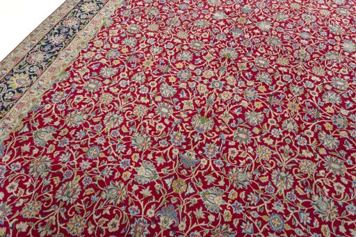 Backside of handmade 2000s Kerman rug showing knot structure and weave density