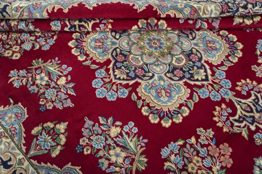 Close-up detail of 2000s Kerman rug from Iran / Persia showing Wool weave