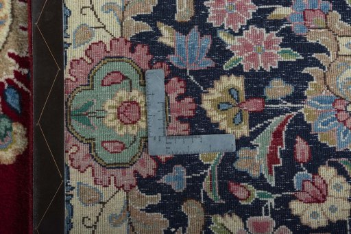 Backside of handmade 2000s Kerman rug showing knot structure and weave density