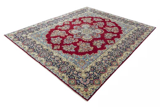 Corner detail of 2000s Kerman rug showing border pattern and Wool pile