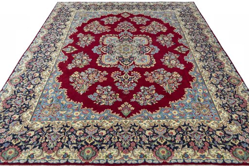 Surface texture of 2000s Kerman rug with natural Wool and intricate pattern