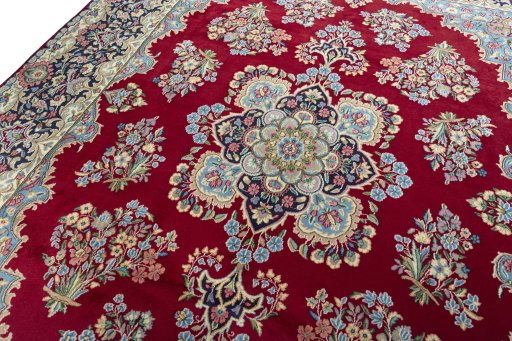 Backside of handmade 2000s Kerman rug showing knot structure and weave density