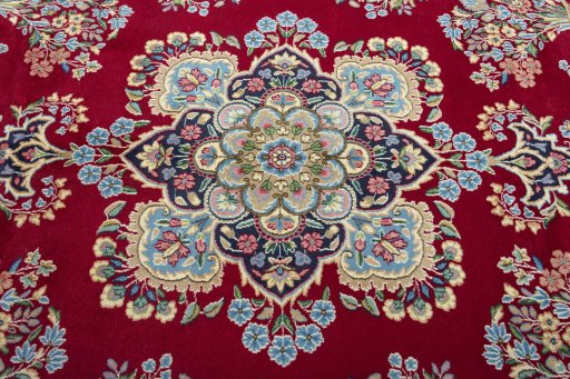 Central medallion detail of 2000s Kerman rug from Iran / Persia