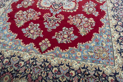 Close-up detail of 2000s Kerman rug from Iran / Persia showing Wool weave