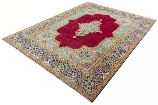 Corner detail of 2000s Kerman rug showing border pattern and Wool pile