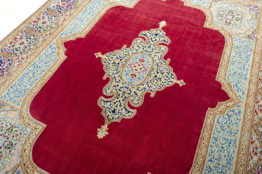 Backside of handmade 2000s Kerman rug showing knot structure and weave density