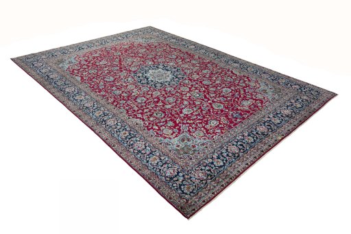 Close-up detail of 2000s Kerman rug from Iran / Persia showing Wool weave