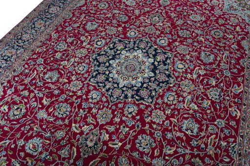 Backside of handmade 2000s Kerman rug showing knot structure and weave density