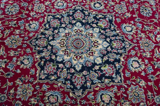 Central medallion detail of 2000s Kerman rug from Iran / Persia
