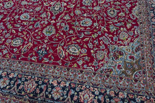 Close-up detail of 2000s Kerman rug from Iran / Persia showing Wool weave