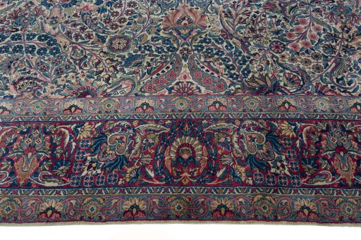 Corner detail of 1930s Kerman rug showing border pattern and Wool pile