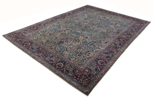 Corner detail of 1930s Kerman rug showing border pattern and Wool pile